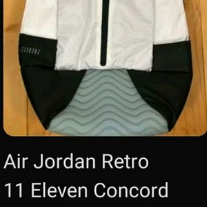 JORDAN 11 *( SPACE JAM EDITION)*